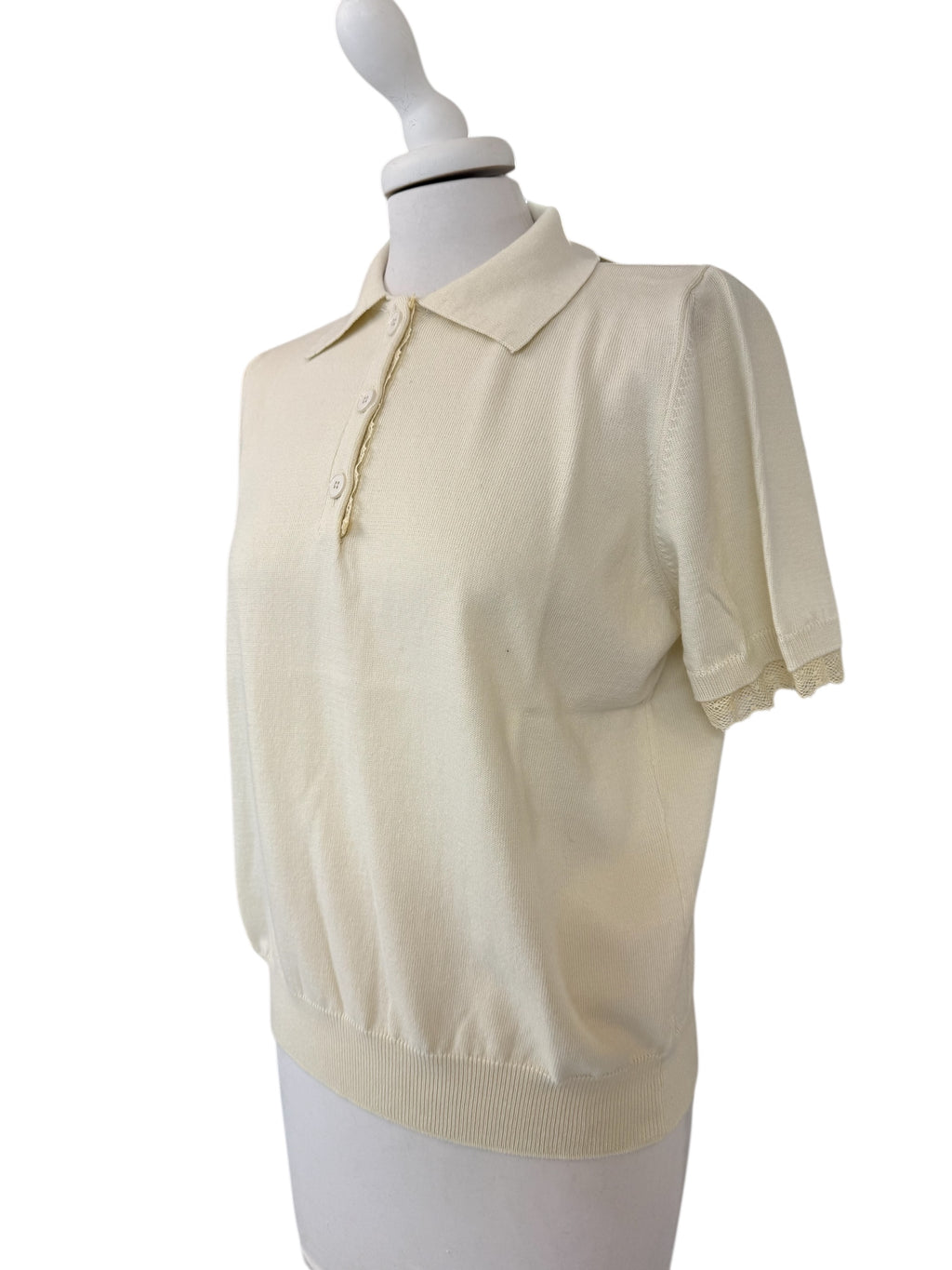 Polo con dettaglio pizzo