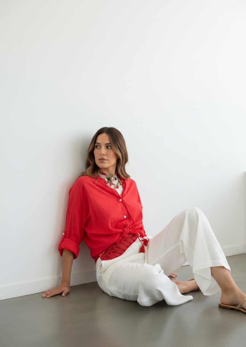 Camicia tinta unita con nappine