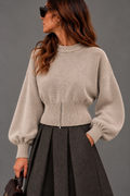 Maglia beige manica palloncino fittata con zip
