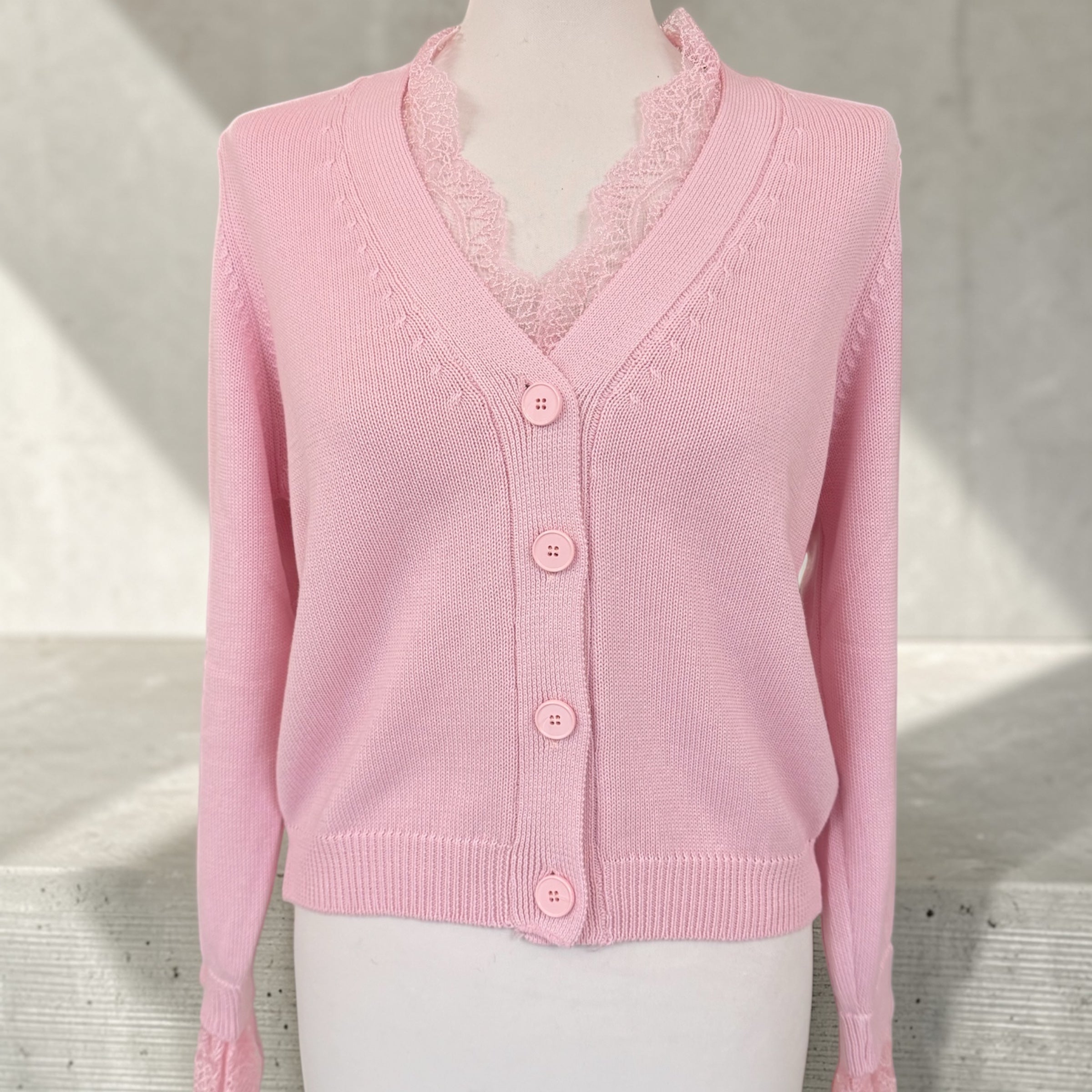 Cardigan con pizzo rosa