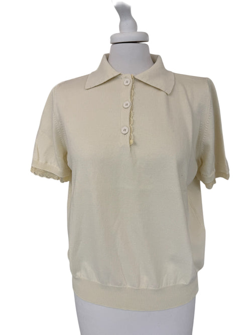 Polo con dettaglio pizzo