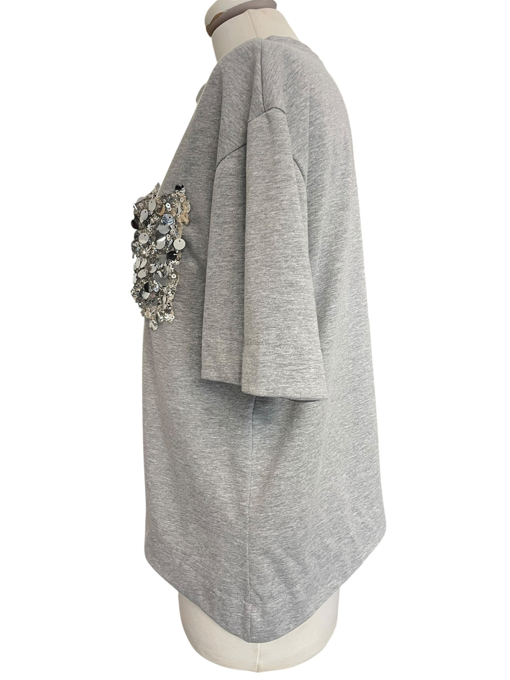 T-shirt asimmetrica taschino paiettes