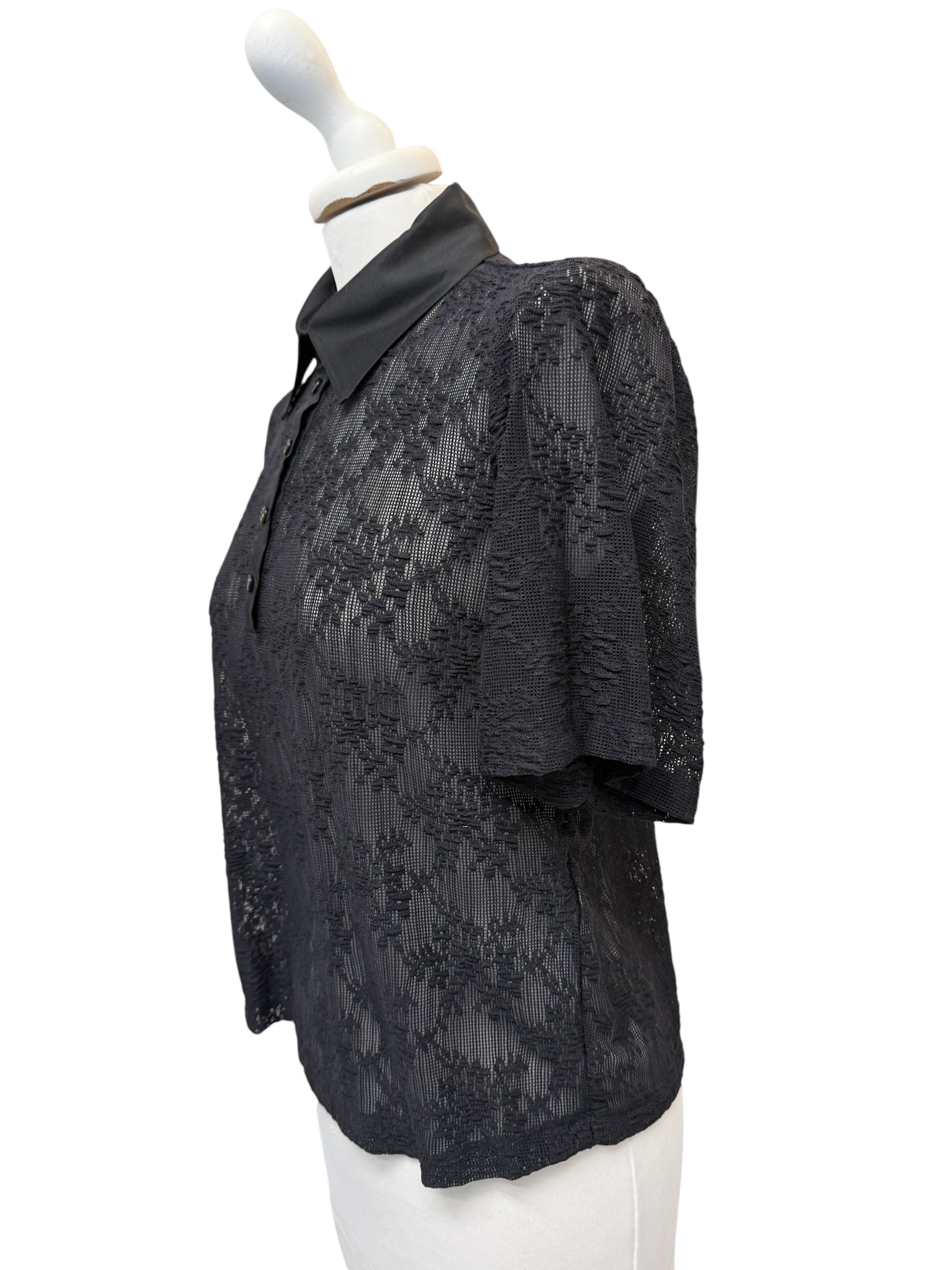 Polo in pizzo nero