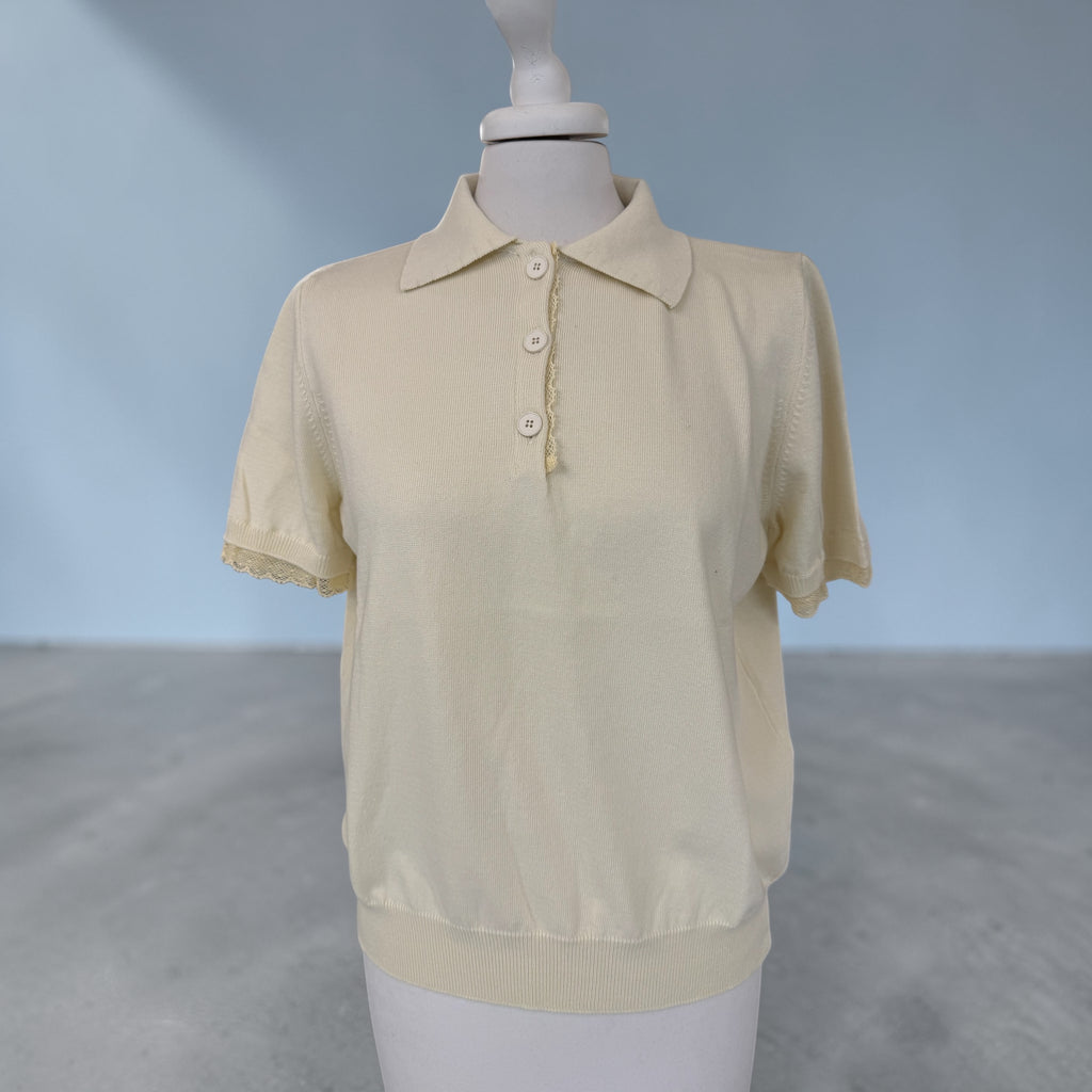 Polo con dettaglio pizzo