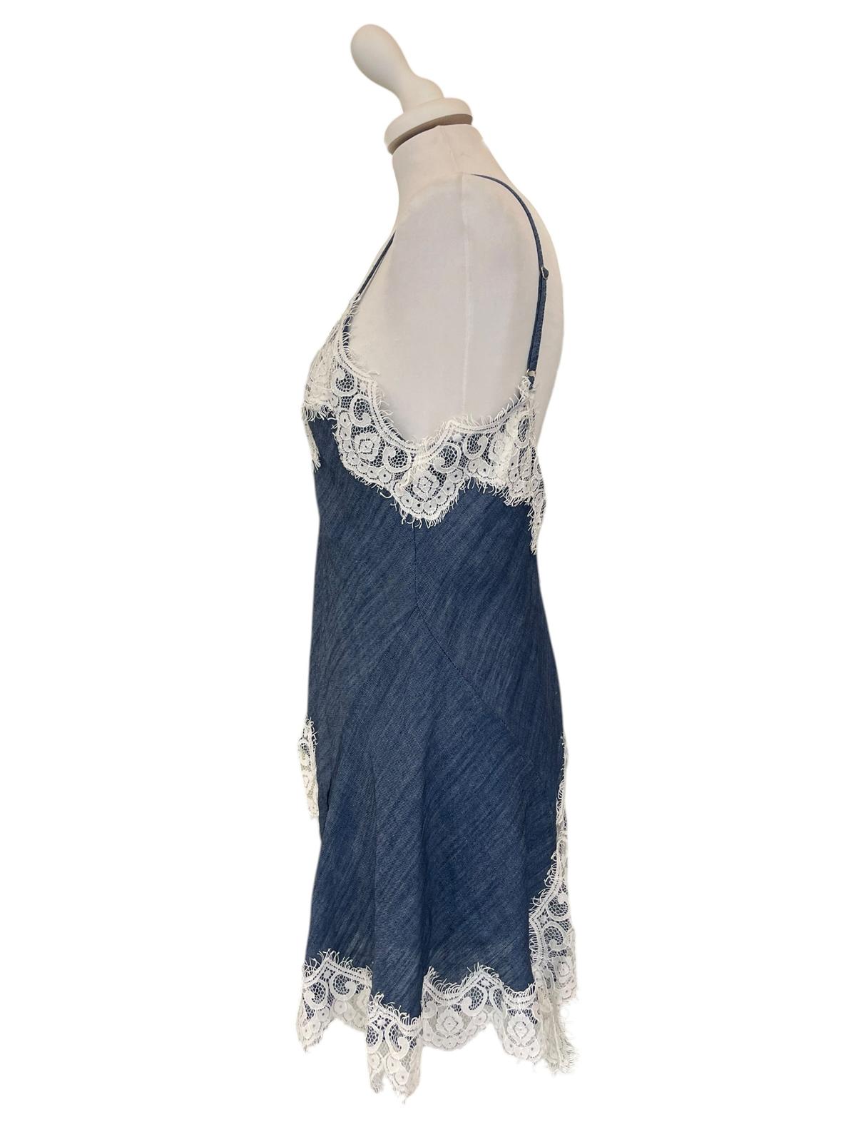 Top denim pizzo