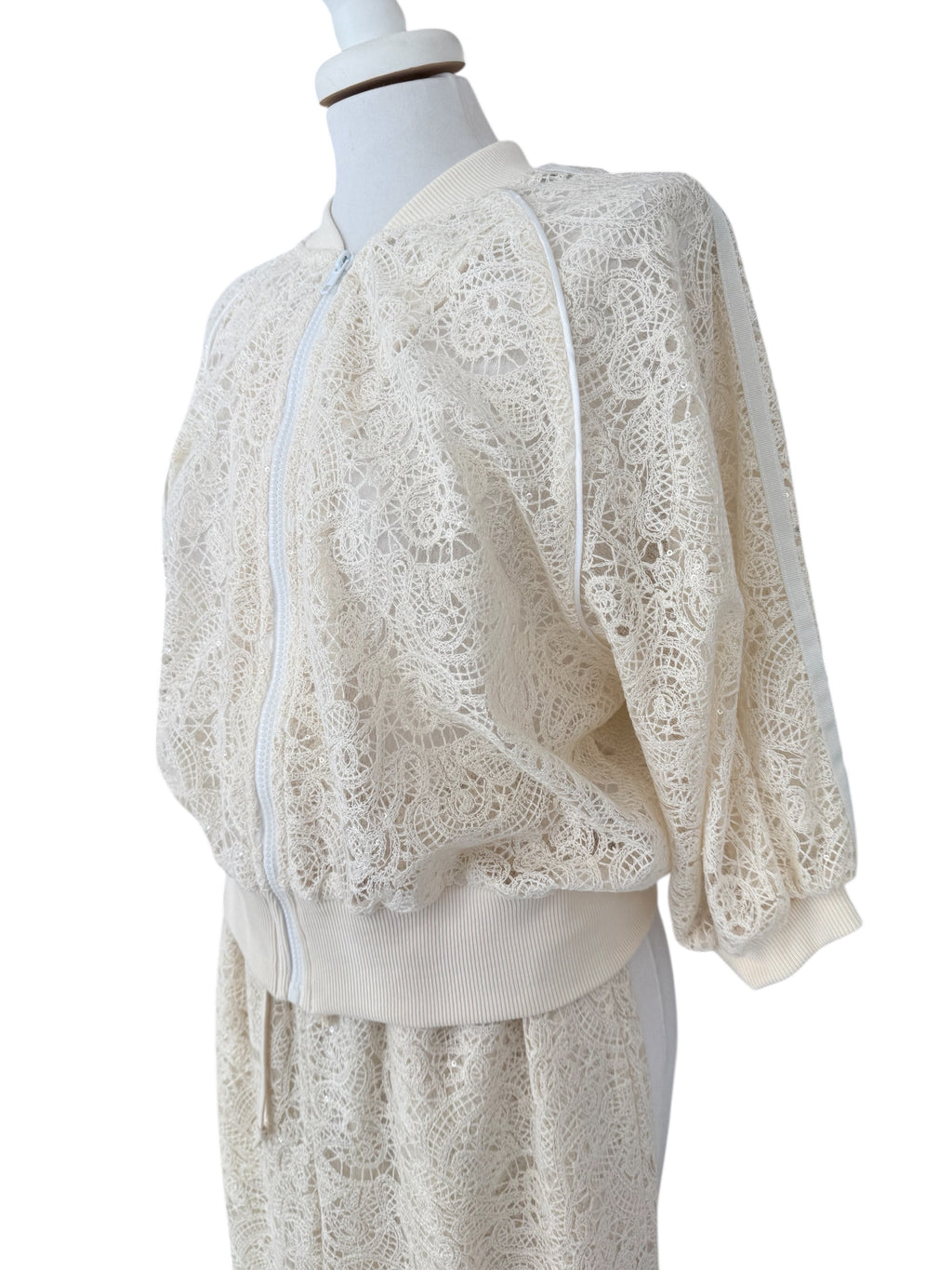 Bomber in pizzo con micropaiettes