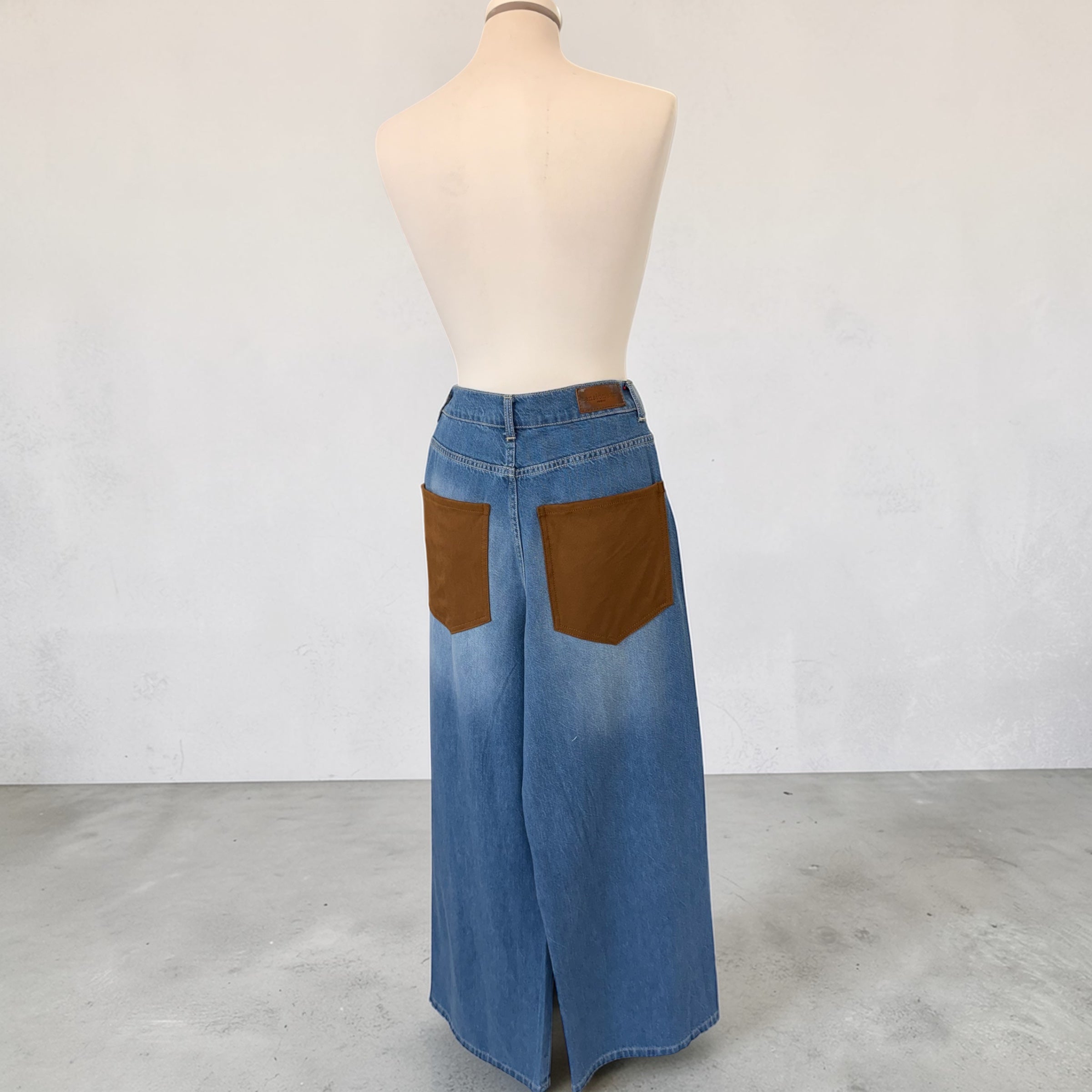Jeans tasca in camoscio