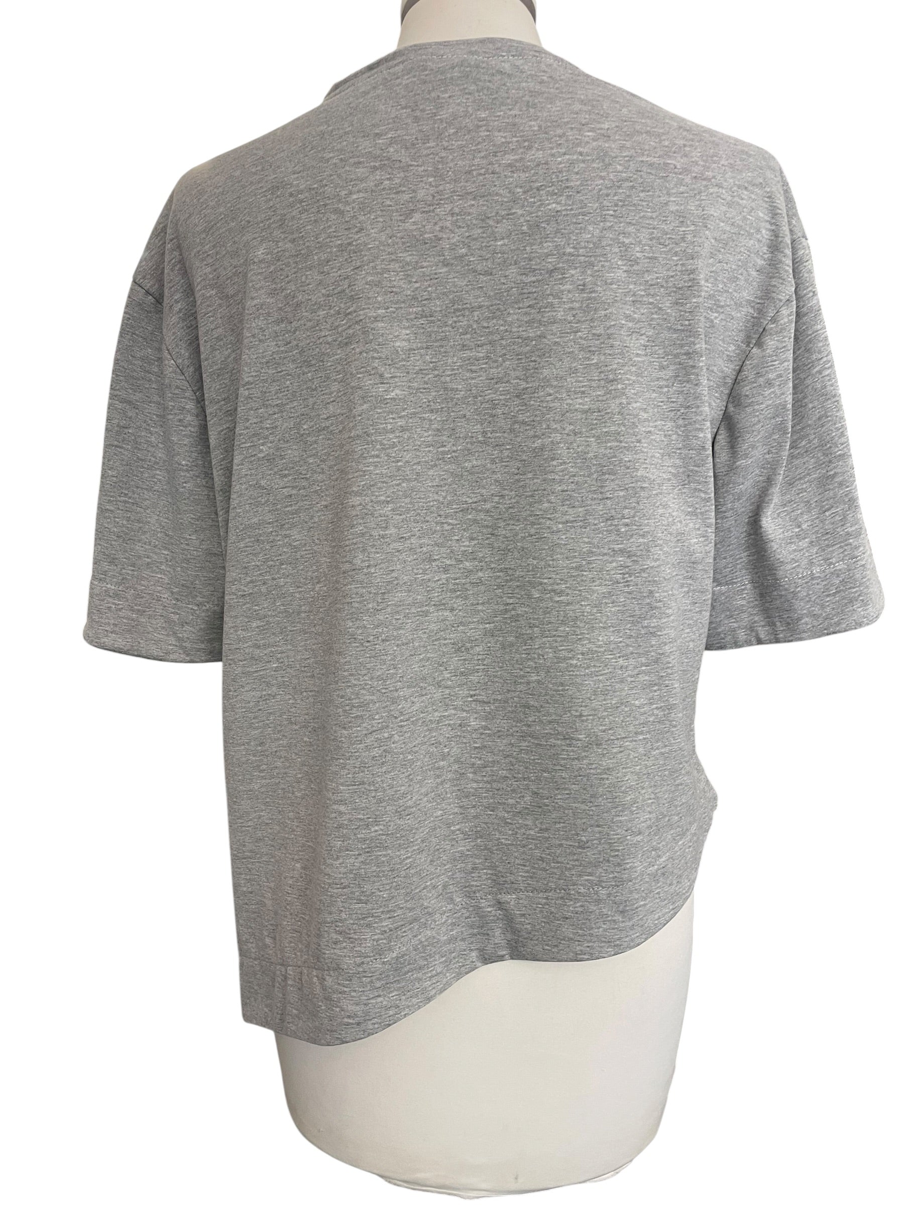 T-shirt asimmetrica taschino paiettes