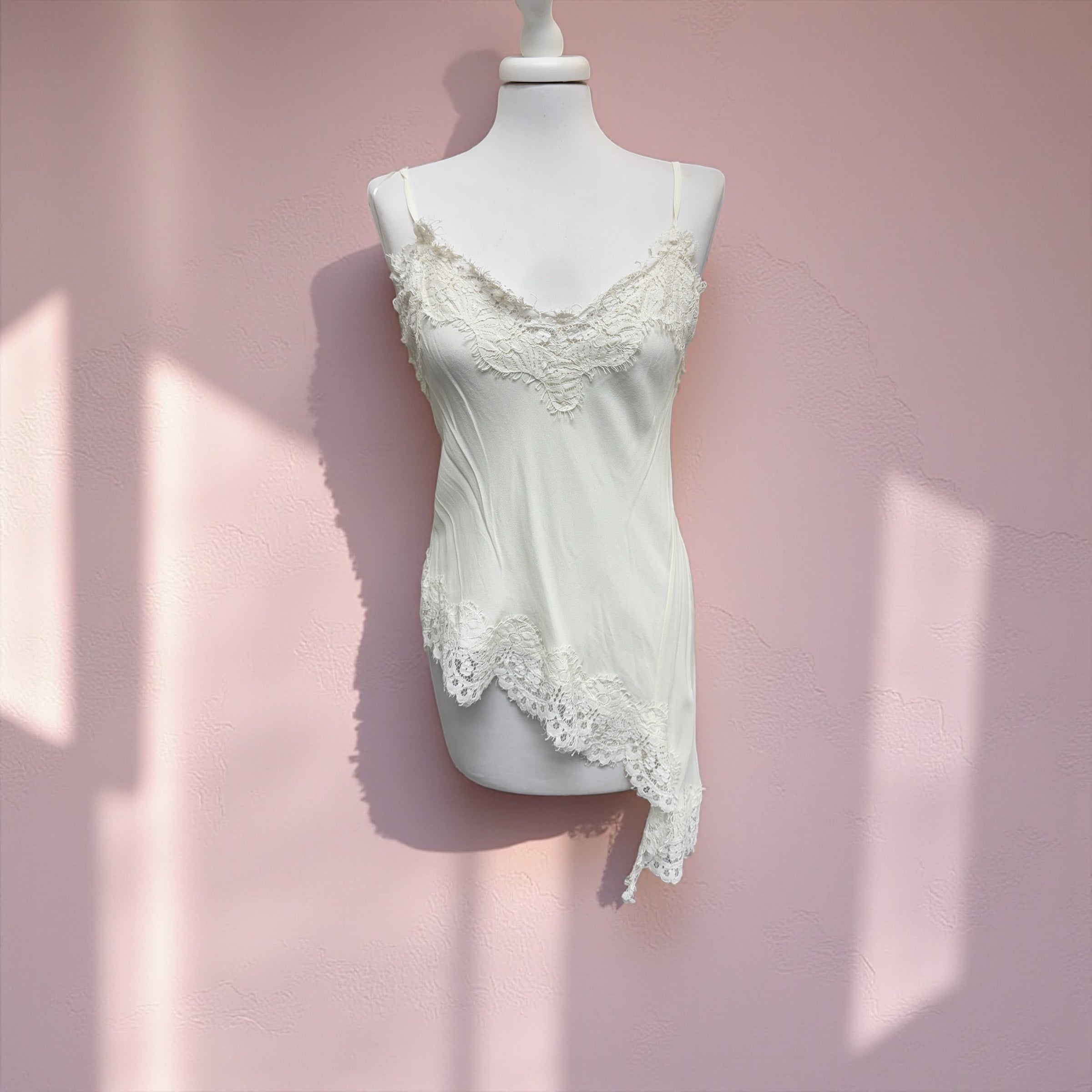 Top asimmetrico pizzo panna