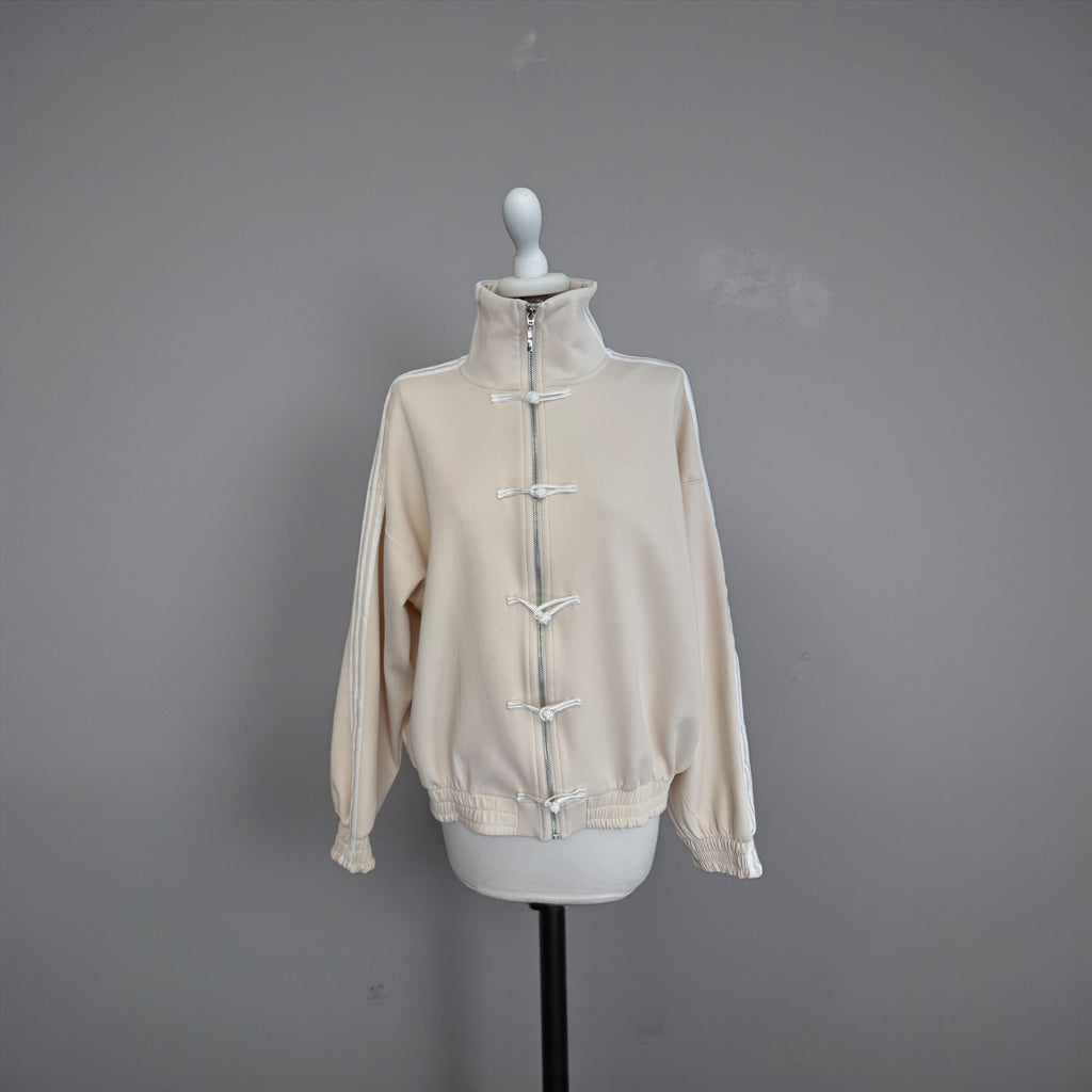 Felpa alamari banda laterale crema