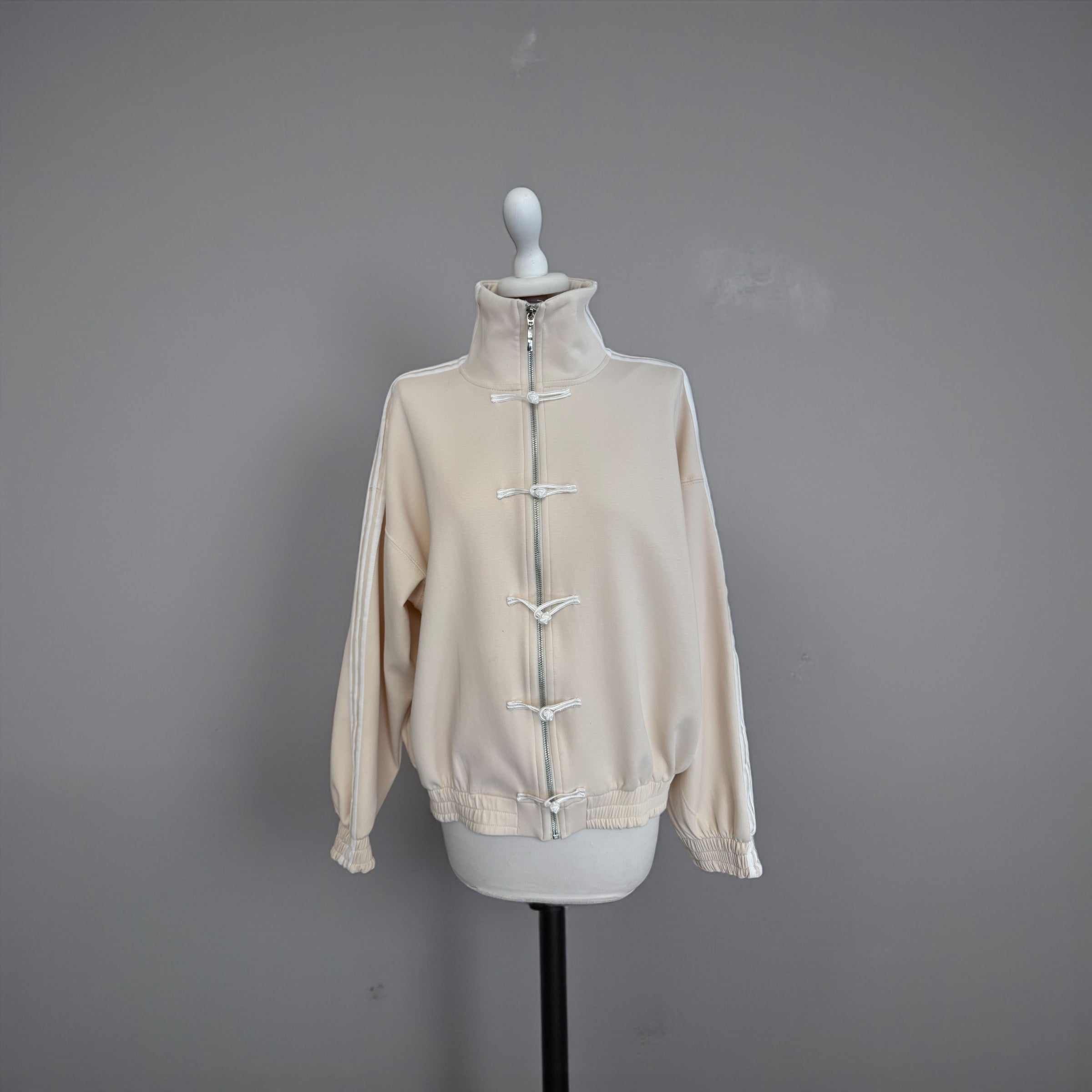 Felpa alamari banda laterale crema