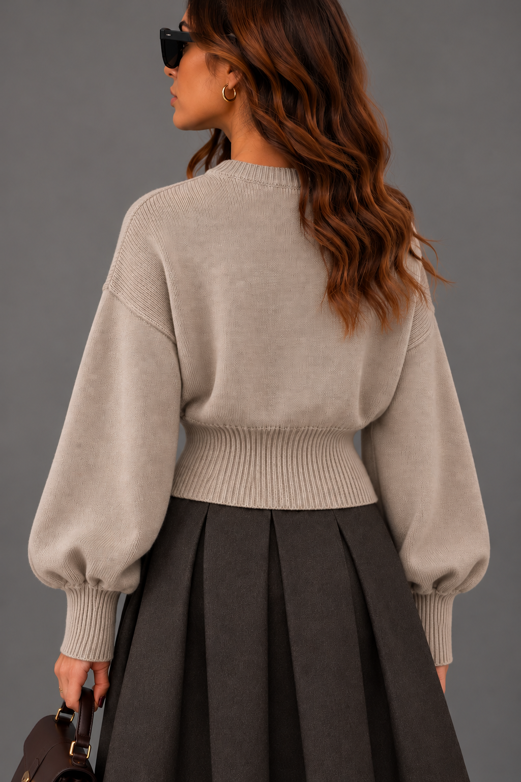 Maglia beige manica palloncino fittata con zip