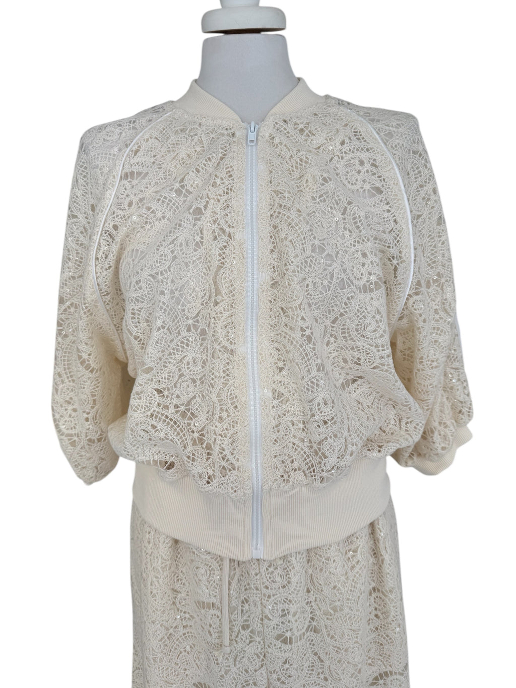 Bomber in pizzo con micropaiettes