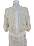 Bomber in pizzo con micropaiettes