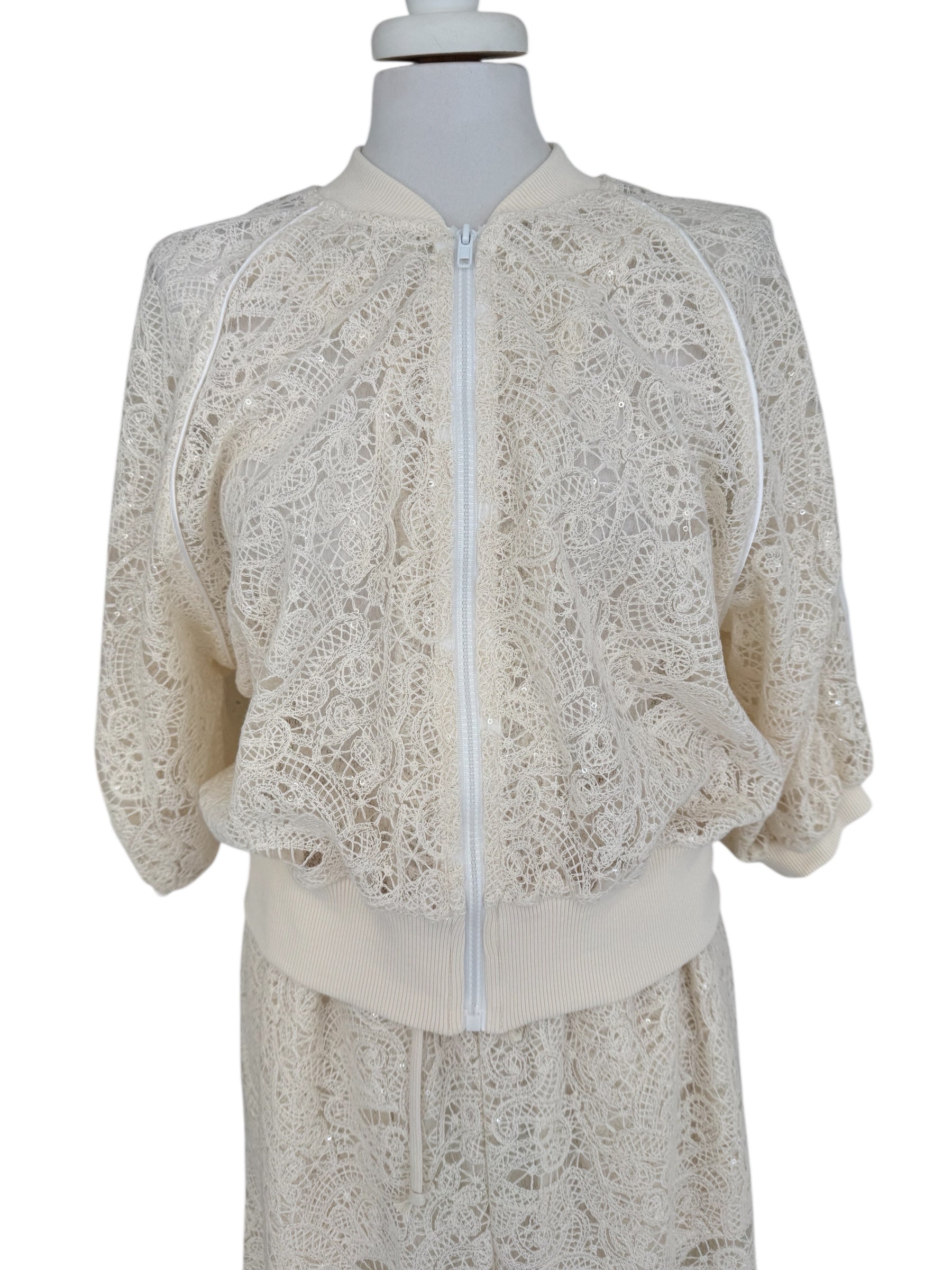 Bomber in pizzo con micropaiettes