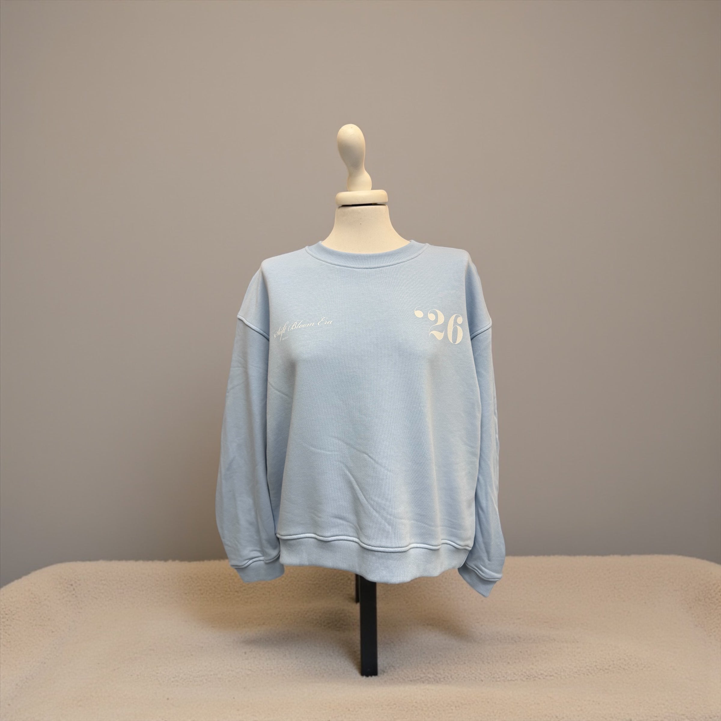 Felpa azzurra scritta bianca