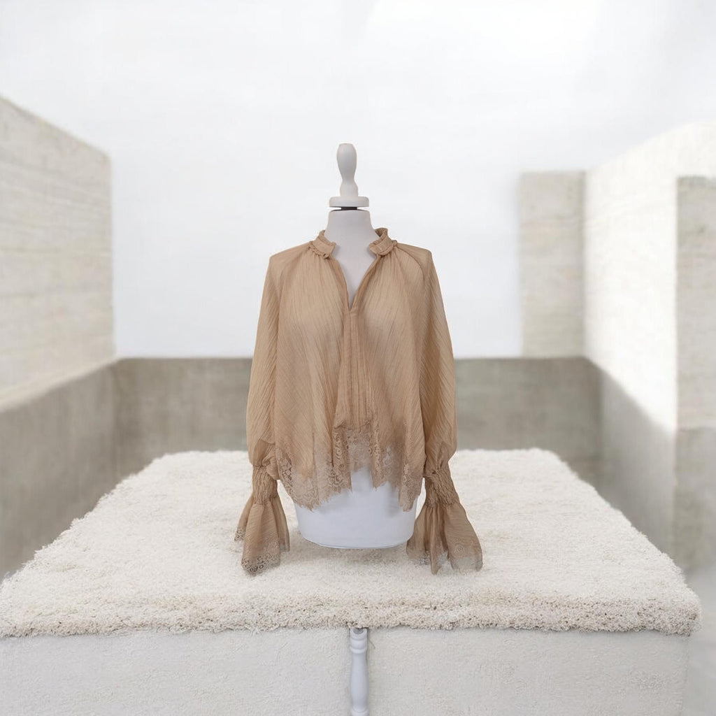 Blusa con pizzo